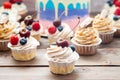 Cheesecake cupcake with cream cheese frosting and fresh cherry on top, wooden background Royalty Free Stock Photo