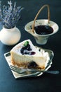Cheesecake with currant and mint leaf