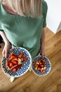 Cheesecake with fresh strawberries and strawberry sauce on a colorful plate. Delicious dessert. Royalty Free Stock Photo