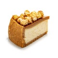 Cheesecake with popcorn and salted caramel. A cut off piece. On a white background, isolated Royalty Free Stock Photo