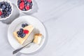 Cheesecake portion slice on plate Royalty Free Stock Photo