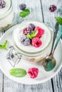 Cheesecake in portioned jars with summer berries