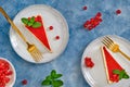 Cheesecake with red currant on a blue background