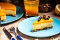 Cheesecake slice on a blue plate