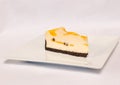 Cheesecake slice on white plate , isolated on white background Royalty Free Stock Photo