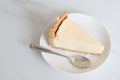 Cheesecake slice on white plate Royalty Free Stock Photo