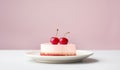 Cheesecake with two cherries on top on a white plate over white minimalist pink background, side view