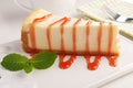 Cheesecake under strawberry sauce Royalty Free Stock Photo