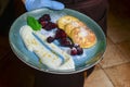 Cheesecakes with mint and sour cream. Yummy dessert, cheese pancakes with berries