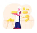 Cheesemaker Wearing White Apron and Toque Holding Round Cheese Standing near Shelves with Assortment