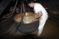 A cheesemonger in a ancient dairy, Franche-ComtÃÂ©, France