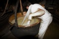 A cheesemonger in a ancient dairy, Franche-ComtÃÂ©, France