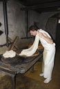 A cheesemonger in a ancient dairy, Franche-ComtÃÂ©, France