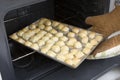 Cheesepuffs baking in oven (Recipe series) Royalty Free Stock Photo