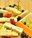 Cheeses. Variety of cheeses. Cheeseboard.