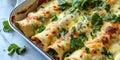 Cheesy baked chicken enchiladas with cilantro in casserole dish Royalty Free Stock Photo