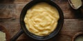 A Cheesy Extravaganza: A Skillet of Melty, Golden Cheese, Ready to Be Devoured Royalty Free Stock Photo