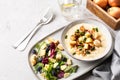 cheesy leek soup with croutons, bacon and fresh lettuce leaves on a wooden table. Royalty Free Stock Photo