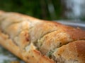 Cheesy stuffed garlic french bread baked on the grill.