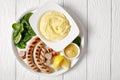 Cheesy whipped potato aligot with pork sausages Royalty Free Stock Photo