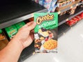 Cheetos Mac `N Cheese at store, hand Royalty Free Stock Photo