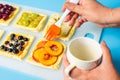 Chef applying egg on the fruit sweet pie Royalty Free Stock Photo