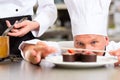 Chef as Patissier cooking in Restaurant dessert Royalty Free Stock Photo