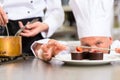 Chef as Patissier cooking in Restaurant dessert Royalty Free Stock Photo