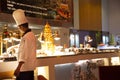 Chef and assistant Chefs cooking and prepared buffet food at restaurant in night time in Bangkok, Thailand