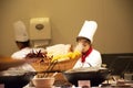 Chef and assistant Chefs cooking and prepared buffet food at restaurant in night time in Bangkok, Thailand