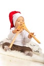 Chef baby eating wooden utensils