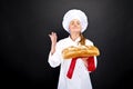 Chef baker smailing,baked bread.