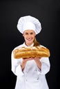 Chef baker smailing,baked bread.