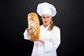 Chef baker smailing,baked bread.