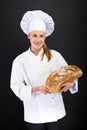 Chef baker smailing, baked bread.