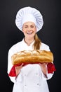 Chef baker smelling baked bread.