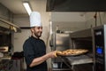 Chef baking Cheese Focaccia from Recco Italy