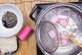 Chef boiling kamaboko fish cake in pot Royalty Free Stock Photo