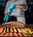 Chef carving beef Royalty Free Stock Photo