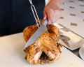 A chef carving roast turkey in a live display Royalty Free Stock Photo