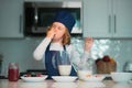 Chef child cooking healthy meal and dinner preparation. Chef kid cook baking at home kitchen. Royalty Free Stock Photo