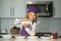 Chef child prepared ingredients. Chef child in apron and chef hat cooking at kitchen. Healthy food. Royalty Free Stock Photo