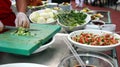 Chef Chopping Salad Ingredients