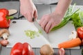 Chef chopping spring onions