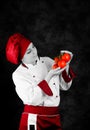 Chef is controlling tomato quality Royalty Free Stock Photo