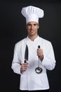 Chef cook against dark background Royalty Free Stock Photo