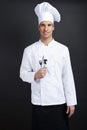 Chef cook against dark background Royalty Free Stock Photo