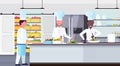 Chef cook carrying plate with meal ingredients mix race workers cooking food culinary teamwork concept modern commercial
