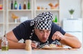 The chef cook cooking a meal breakfast dinner in the kitchen Royalty Free Stock Photo