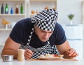 Chef cook cooking a meal breakfast dinner in the kitchen Royalty Free Stock Photo